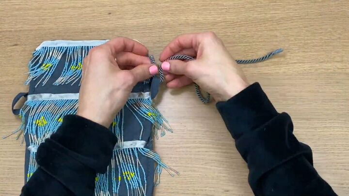 how to make a no sew diy crossbody bag out of dollar tree potholders, Adding a cord for the bag strap