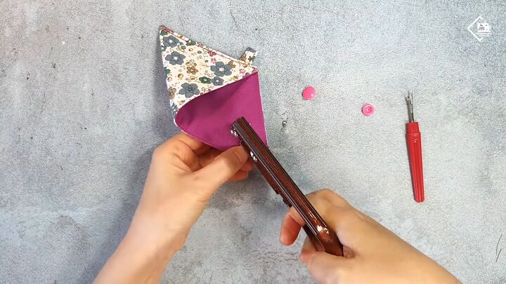 how to make a cute diy triangle pouch for coins earphones more, Using a button puncher to add buttons