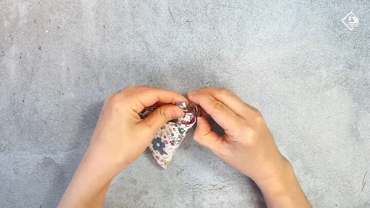 how to make a cute diy triangle pouch for coins earphones more, Adding a ring to the loop