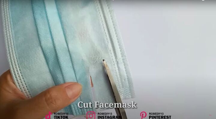 how to make diy fake nails out of a face mask baby powder, Cutting out a nail shape in the face mask