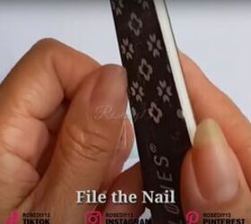 how to make diy fake nails out of a face mask baby powder, Filing a nail with a nail file