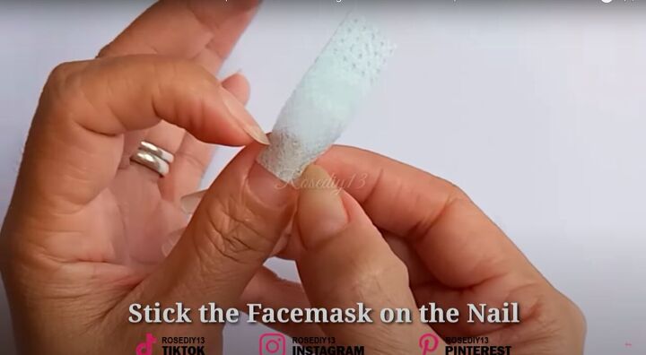 how to make diy fake nails out of a face mask baby powder, Sticking the face mask fabric to the nail