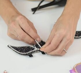 how to make stunning diy butterfly wing heels at home, Poking holes in the tabs with an awl
