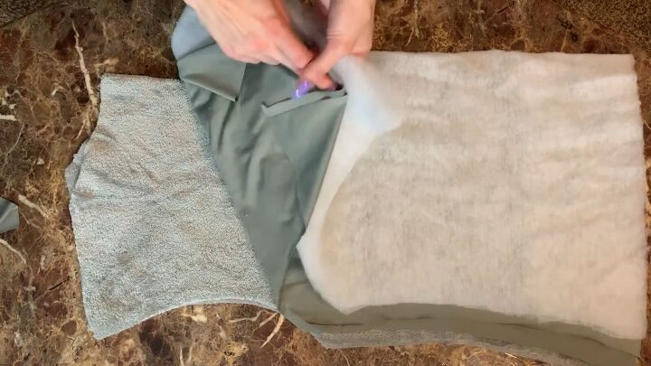 how to make a puffer jacket out of a plush walmart blanket, Layers of batting exterior fabric and lining
