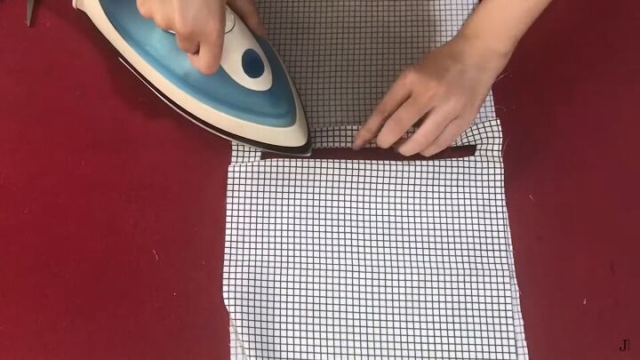 how to make a simple diy fabric clutch bag, Ironing the fabric to make it neat