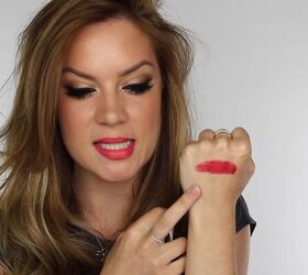 how to remove lipstick stains from lips using olive oil, Applying red lipstick to the back of the hand