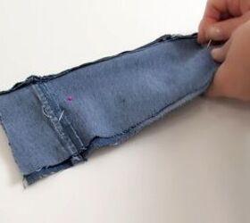 how to make a cute diy wrist wallet out of old jeans, Flipping the fabric