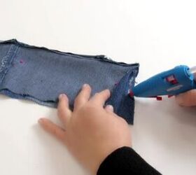 how to make a cute diy wrist wallet out of old jeans, Gluing the open edges