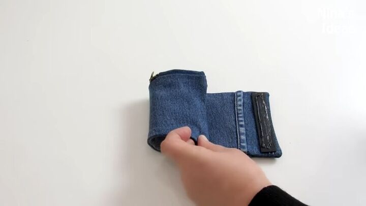 how to make a cute diy wrist wallet out of old jeans, How to make a DIY wrist wallet