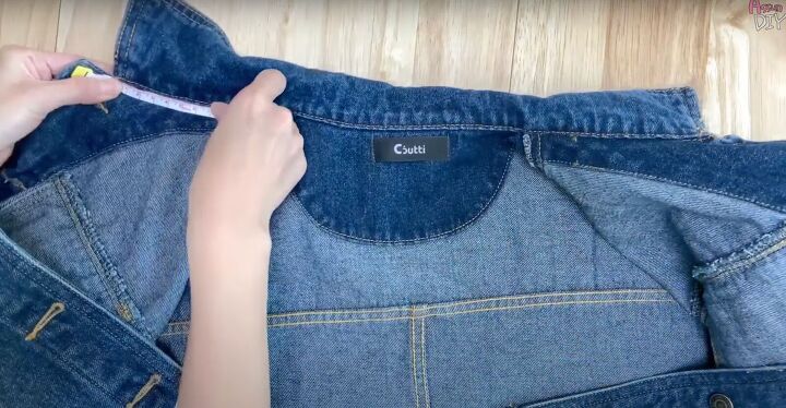 add a hood to any jacket with this simple detachable hood diy, Measuring the neckline of the denim jacket