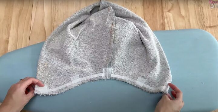 add a hood to any jacket with this simple detachable hood diy, Placing interfacing on the marks
