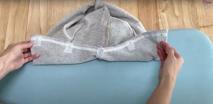 add a hood to any jacket with this simple detachable hood diy, Placing interfacing on the marks both sides