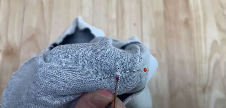 add a hood to any jacket with this simple detachable hood diy, Seam ripping the buttonholes