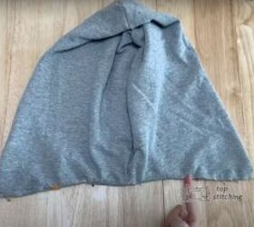 add a hood to any jacket with this simple detachable hood diy, Folding and tucking the unsewn ends