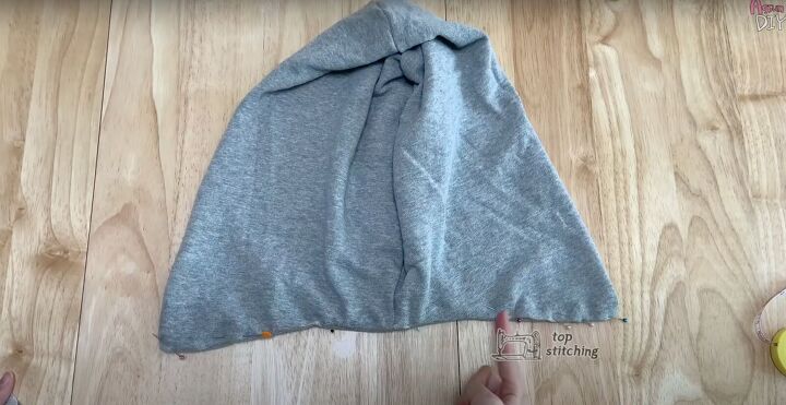 add a hood to any jacket with this simple detachable hood diy, Folding and tucking the unsewn ends