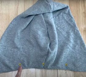 add a hood to any jacket with this simple detachable hood diy, Using the marks to places the buttons