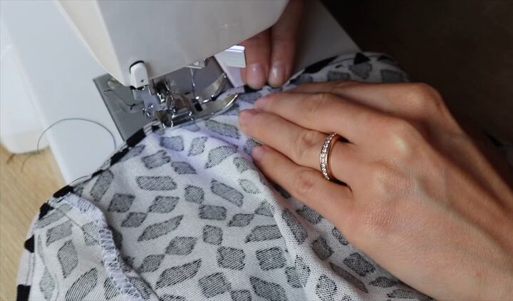 need a cute easy sewing project try this shirred skirt tutorial, Hemming the bottom of the DIY shirred skirt