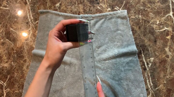 how to make cozy fleecy joggers out of a large fuzzy blanket, Measuring the elastic for the pocket placement