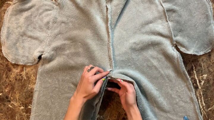how to make cozy fleecy joggers out of a large fuzzy blanket, Pinning the crotch area