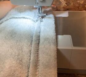 how to make cozy fleecy joggers out of a large fuzzy blanket, Sewing the waistband in place