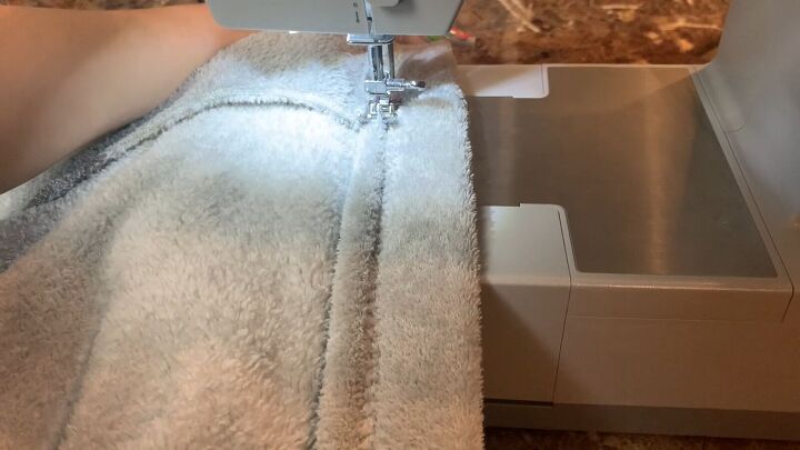 how to make cozy fleecy joggers out of a large fuzzy blanket, Sewing the waistband in place