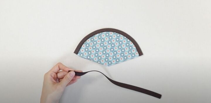 how to make a cute pizza or pie shaped diy coin purse, Unzipping the zipper ready to sew