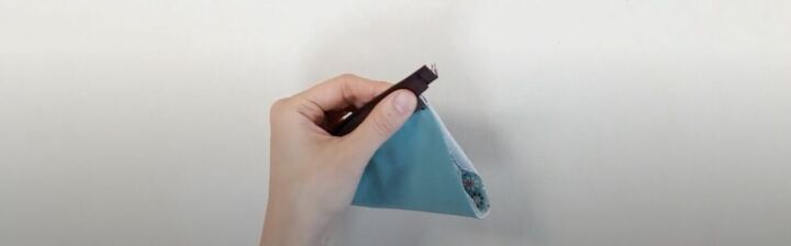 how to make a cute pizza or pie shaped diy coin purse, Trimming the excess zipper