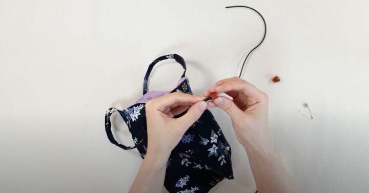 how to make a cute diy drawstring tote bag free pattern in 2 sizes, Adding wooden beads to the cord ends
