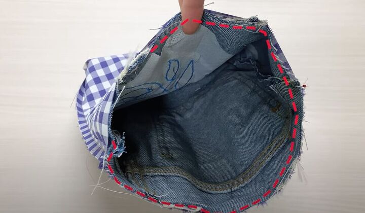 how to make a quick simple diy denim tote bag out of a jean skirt, Sewing the lining to the DIY denim tote bag