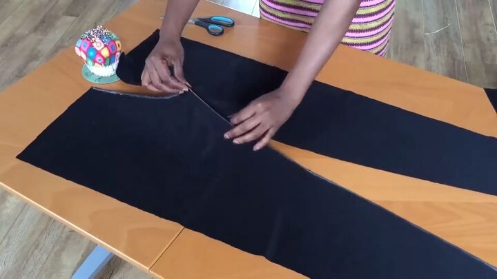how to make joggers with a cut out pattern in 6 simple steps, Place the pattern pieces together