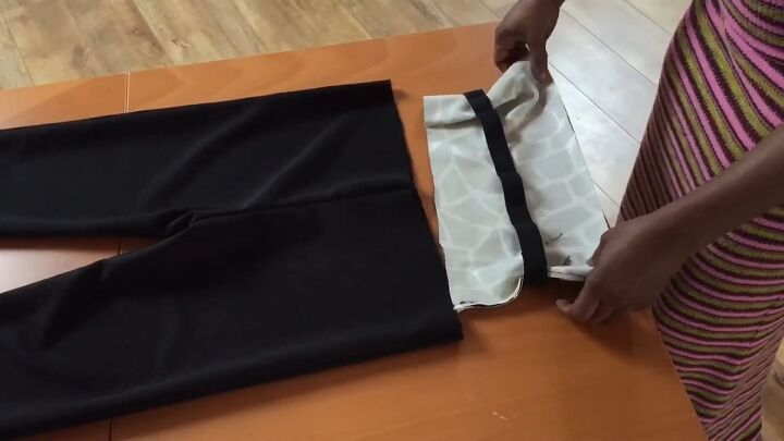how to make joggers with a cut out pattern in 6 simple steps, Placing the elastic inside the waistband