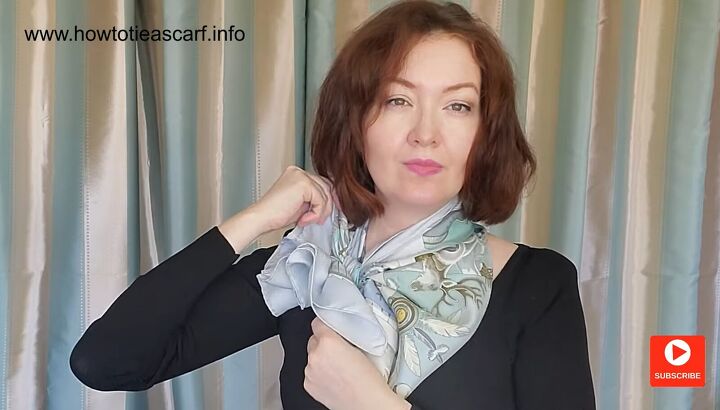3 cute easy ways you can style a silk scarf with a scarf buckle, Pulling the scarf by the scarf buckle to secure the knot