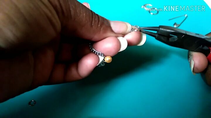 how to make stud earrings unique by adding chains charms more, Opening the jump ring with pliers