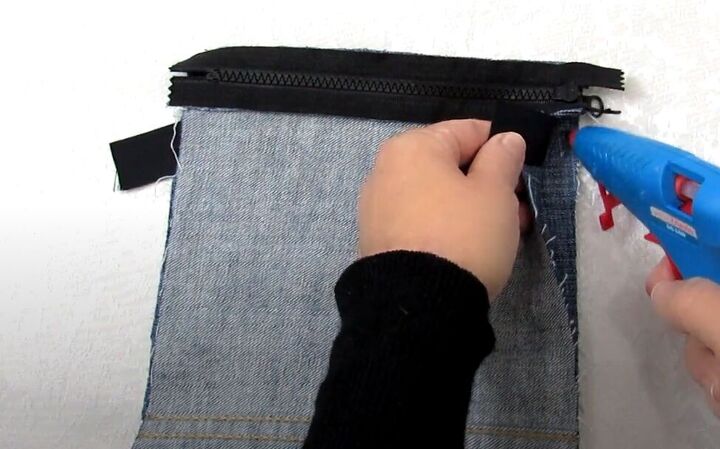 how to make a crossbody bag out of jeans without sewing, Gluing the sides of your crossbody bag