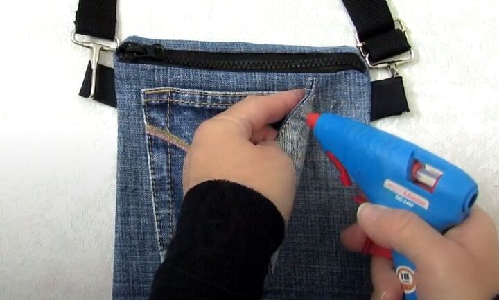 how to make a crossbody bag out of jeans without sewing, Gluing the pocket onto the bag