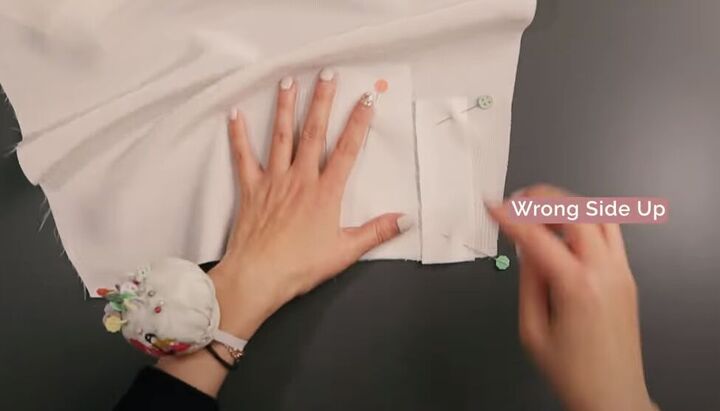 how to easily sew a sleeve placket and cuff in a few simple steps, Pinning the placket and binding