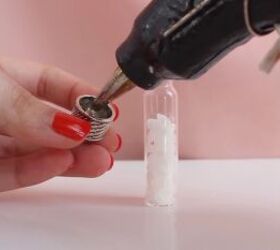 how to easily make diy jar necklaces filled with glitter salt more, Gluing the cap to the jar with a hot glue gun