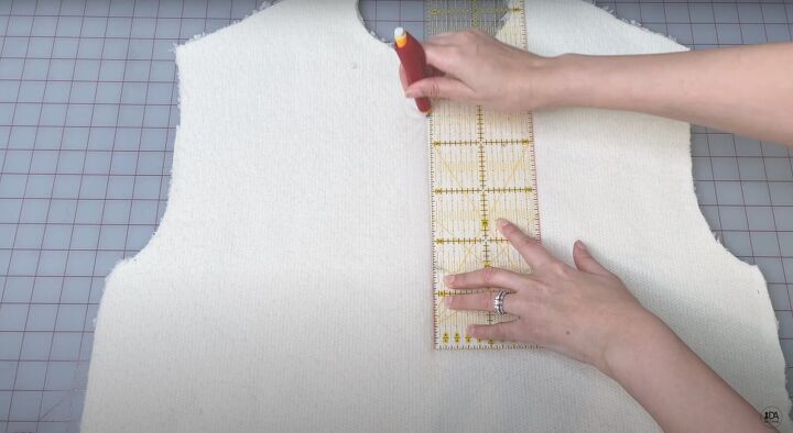 how to sew a sweater with a cute cropped hem half zipper, Placing the seam on the zipper frame
