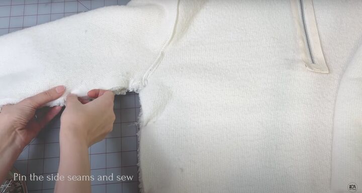 how to sew a sweater with a cute cropped hem half zipper, Pinning the inner seams of the sweater sleeves