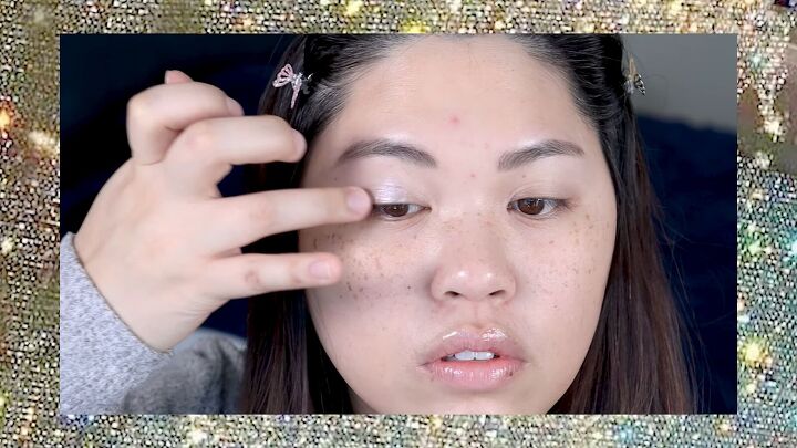 put a spin on 90s makeup with this fun 1990s inspired makeup tutorial, Applying eyeshadow with fingers