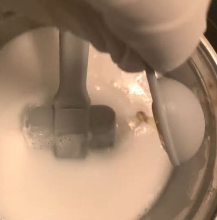 how to make a turmeric honey soap bar using a melt pour base, Adding honey to the soap mixture