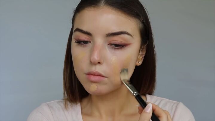 how to create a sweet soft glowy spring makeup look, Applying foundation with a foundation brush