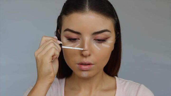 how to create a sweet soft glowy spring makeup look, Applying concealer under the eyes and to the nose