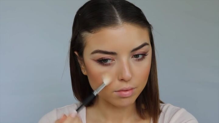 how to create a sweet soft glowy spring makeup look, Applying highlighter to the highest points of the face
