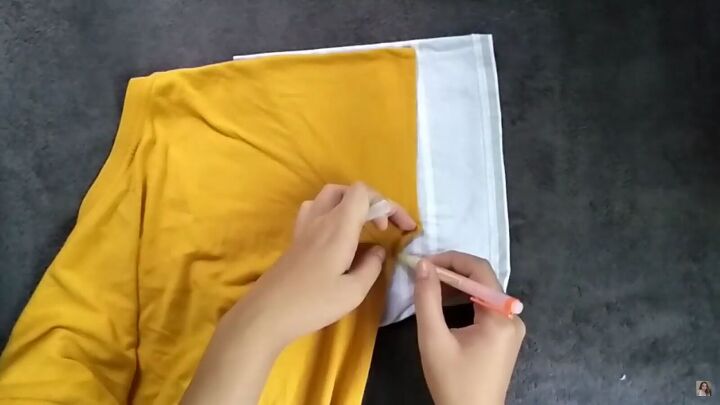 how to make an easy diy off the shoulder top out of a large t shirt, Tracing a t shirt for a sleeve pattern
