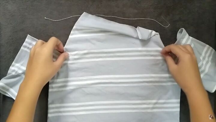 how to make an easy diy off the shoulder top out of a large t shirt, Sewing the new neckline