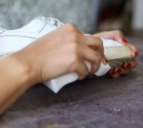 how to make sneakers white again making old yellow sneakers look new, Using a magic eraser sponge to clean the sneakers