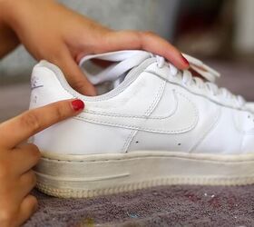how to make sneakers white again making old yellow sneakers look new, Using the magic eraser on scuff marks