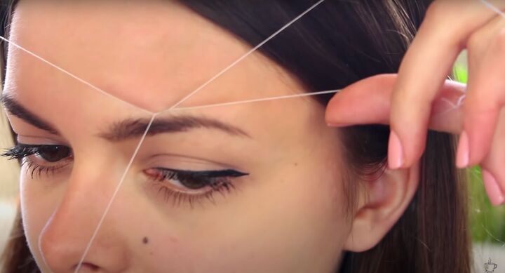 how to do threading on facial hair in 6 simple steps, Eyebrow threading