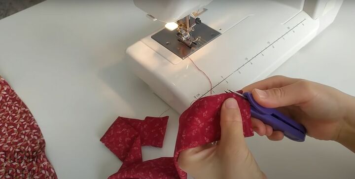 how to easily make a cute diy mini wrap skirt without a pattern, Cutting the corners of the waistband tie